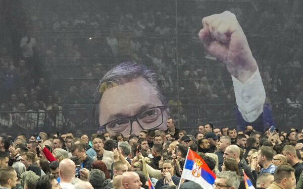 An image of Serbian President Aleksandar Vucic is seen during a pre-election rally of his ruling Serbian Progressive Party in Belgrade, Serbia, Saturday, Dec. 2, 2023. When Serbia formally opened membership negotiations with the European Union, back in 2014, it was a moment of hope for pro-Western Serbs, eager to set their troubled country on an irreversible path to democratization. Those days are long gone. Now, they feel betrayed, both by the government and the EU. (AP Photo/Darko Vojinovic)